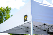 A close-up of the Compact Shelter’s 300D canopy, highlighting its durable fabric with UPF 50+ sun protection, water resistance, and flame resistance for all-weather reliability.